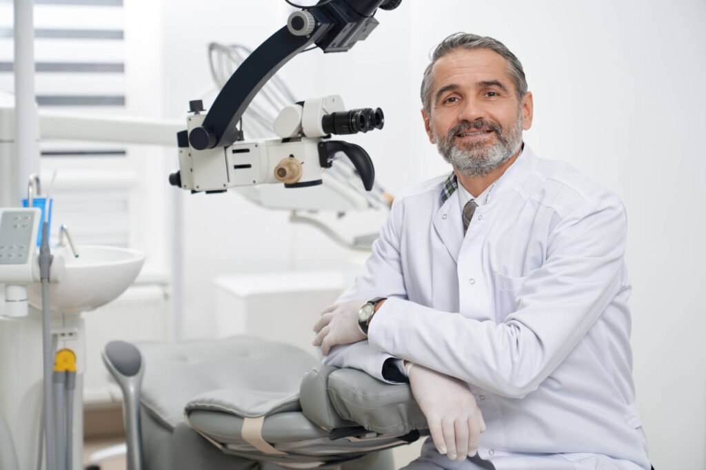 dentist-posing-on-workplace-in-modern-clinic-RHDBPL7.jpg